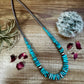 22 inch graduated turquoise necklace with Sterling silver pearls