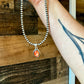 Oval Pendant - sterling silver with orange spiny