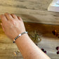 6 mm sterling silver pearls bracelet with  pink conch